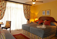 Spacious and comfortable with child bed. Sliding door onto garden & pool.